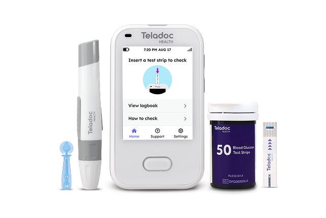 Blood Glucose Meter with lancet and test strips.