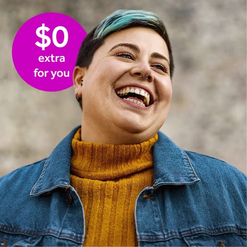 Smiling woman wearing a denim jacket, representing a Teladoc Health Diabetes Prevention Program participant.