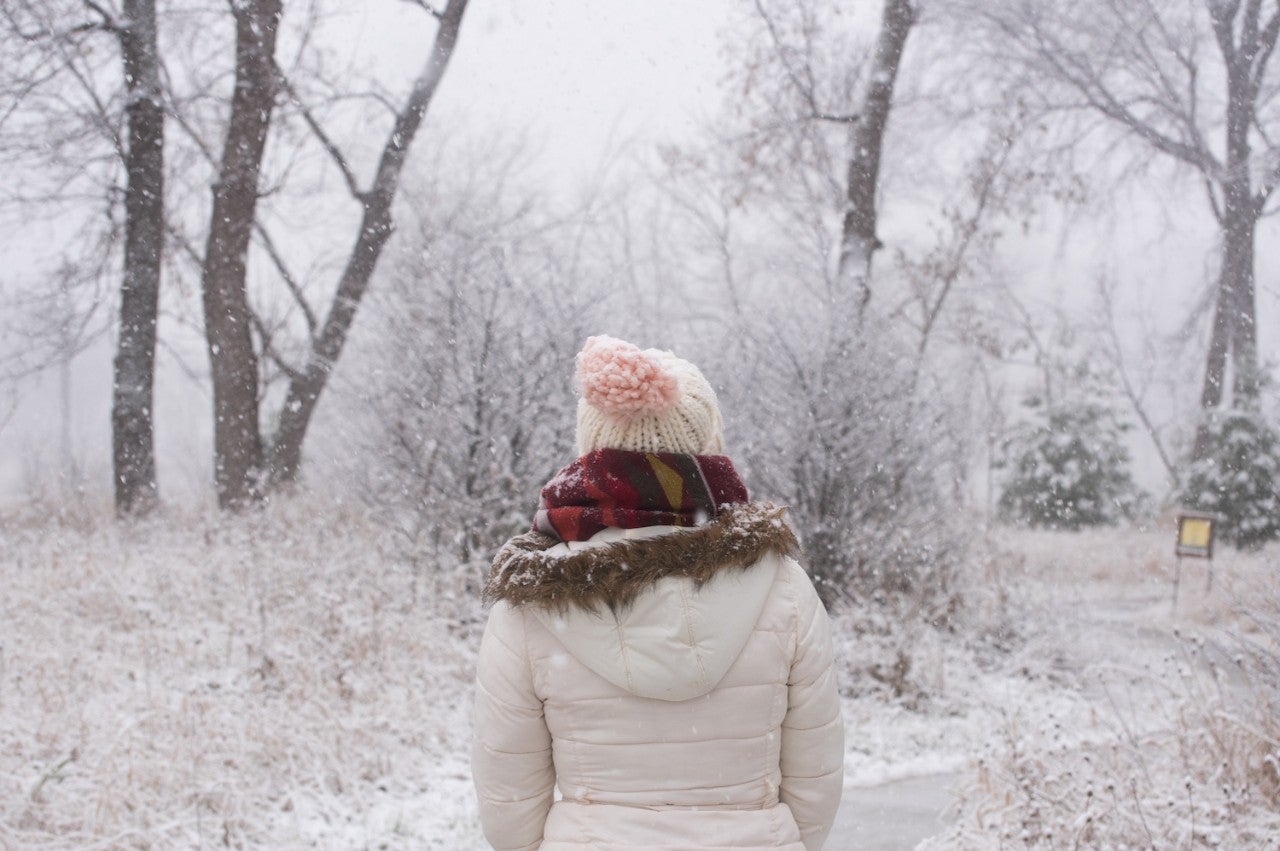 Woman in a winter park