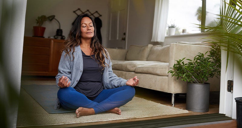 31 days of mental self-care woman meditating