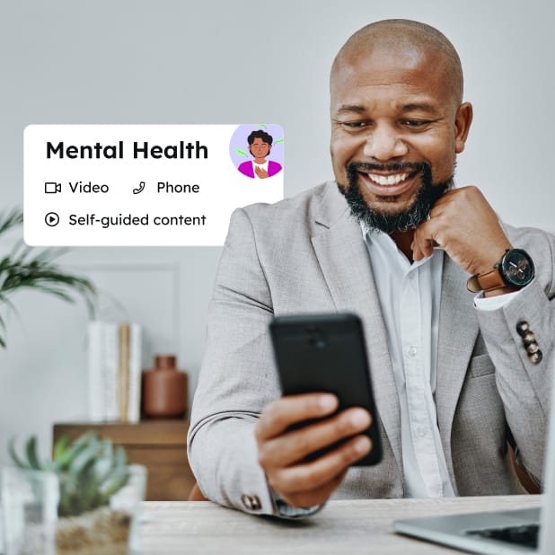 Man in suit looking at mobile phone with words in bubble on the left saying "Mental Health."
