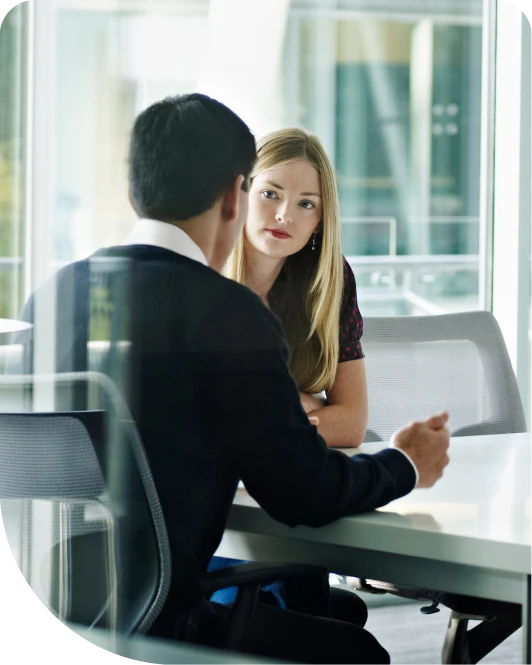 Man and woman talking in an office