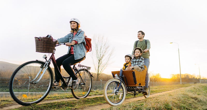 Family riding bikes. 