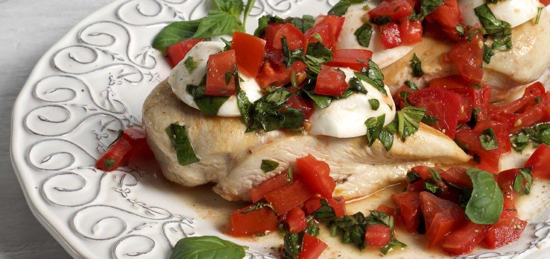 Balsamic glazed chicken on a decorative plate