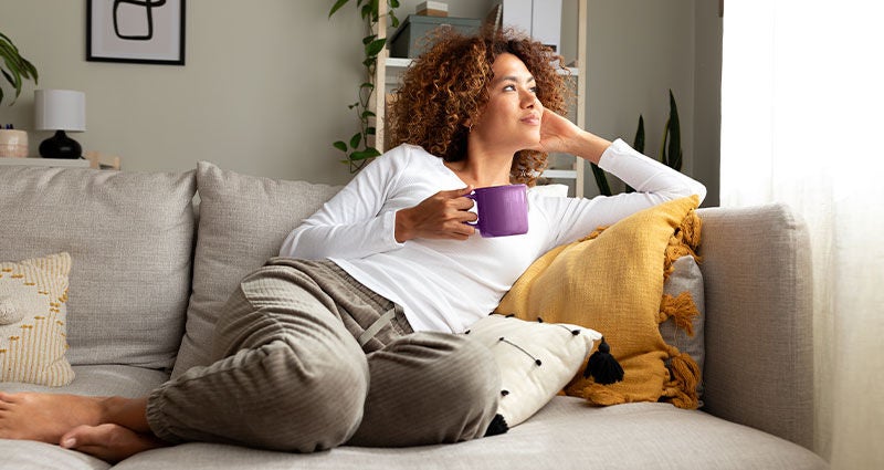 Coffee is it good for you or not woman enjoying a cup