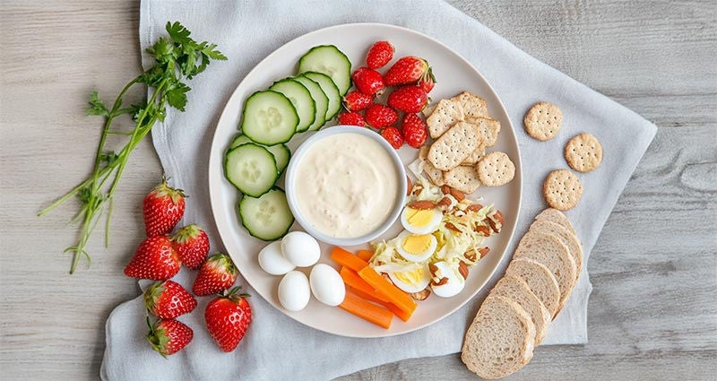 Farmer's market picky plate featuring fruits and veggies. 