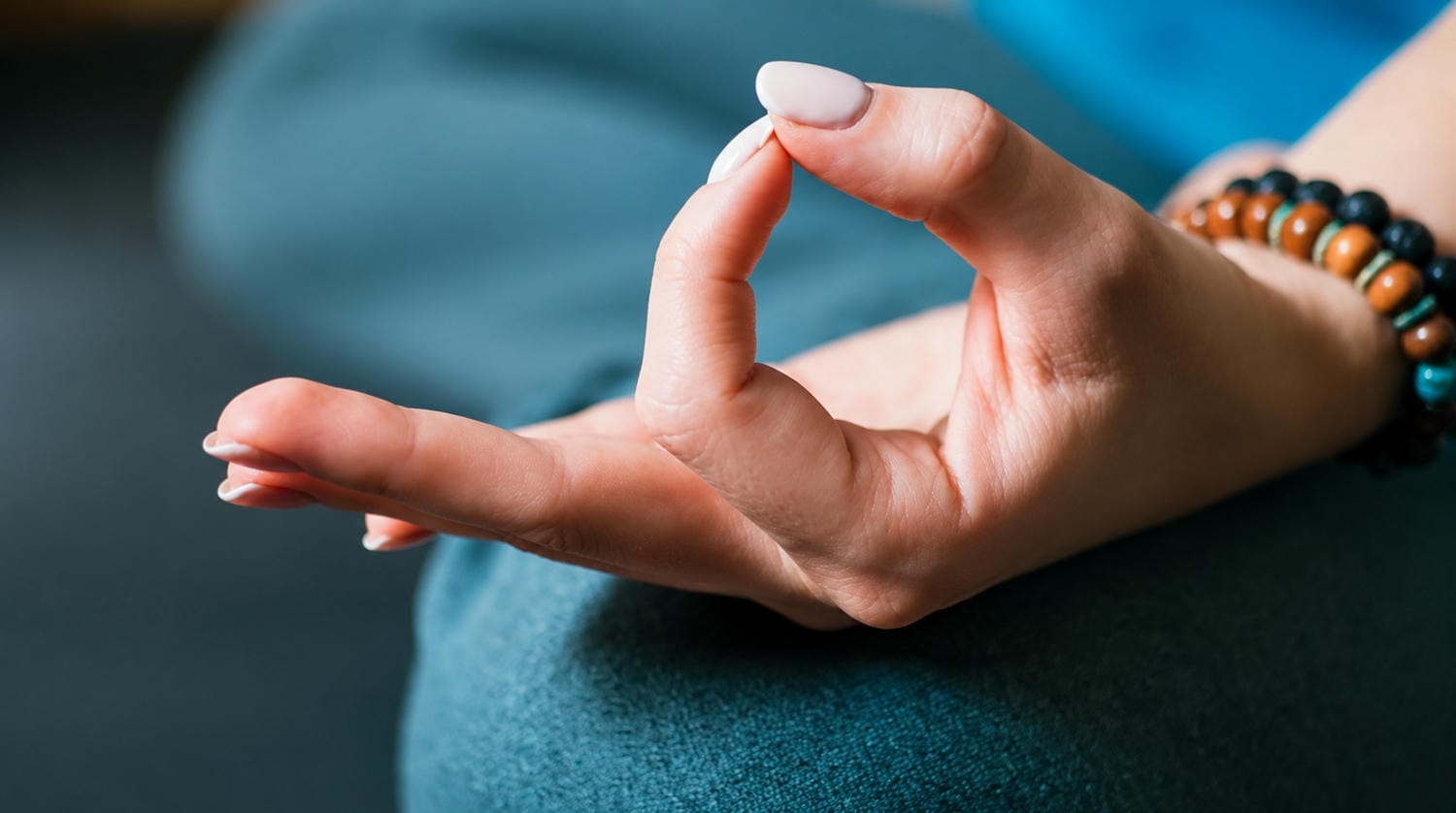 Hand in meditation pose