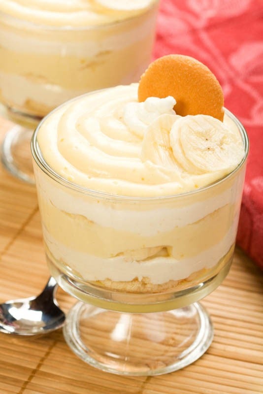 Holiday and gathering favorite banana pudding layered with whipped cream and nilla wafers