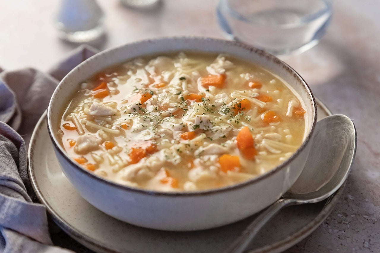 Chicken noodle soup in a bowl.