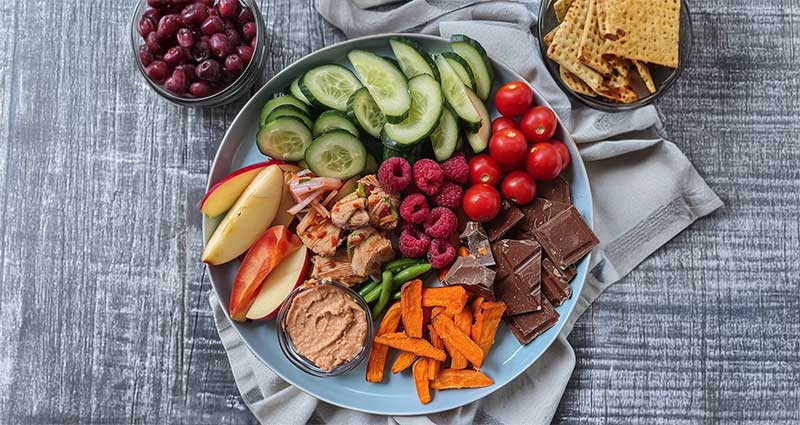 Raid the fridge picky plate featuring a variety of foods. 