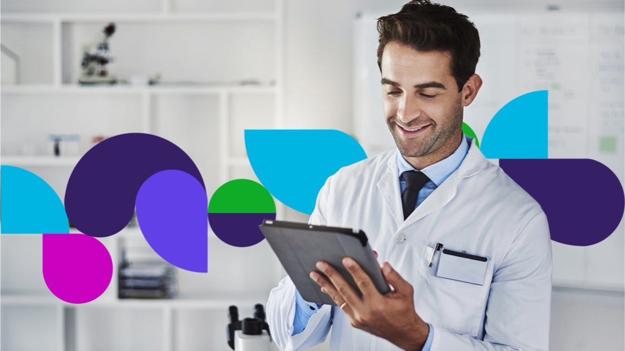 Doctor looking at tablet
