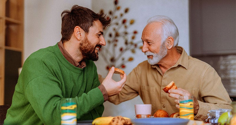 The chew: Dad and son enjoying a meal