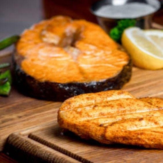 Chicken breast on a cutting board