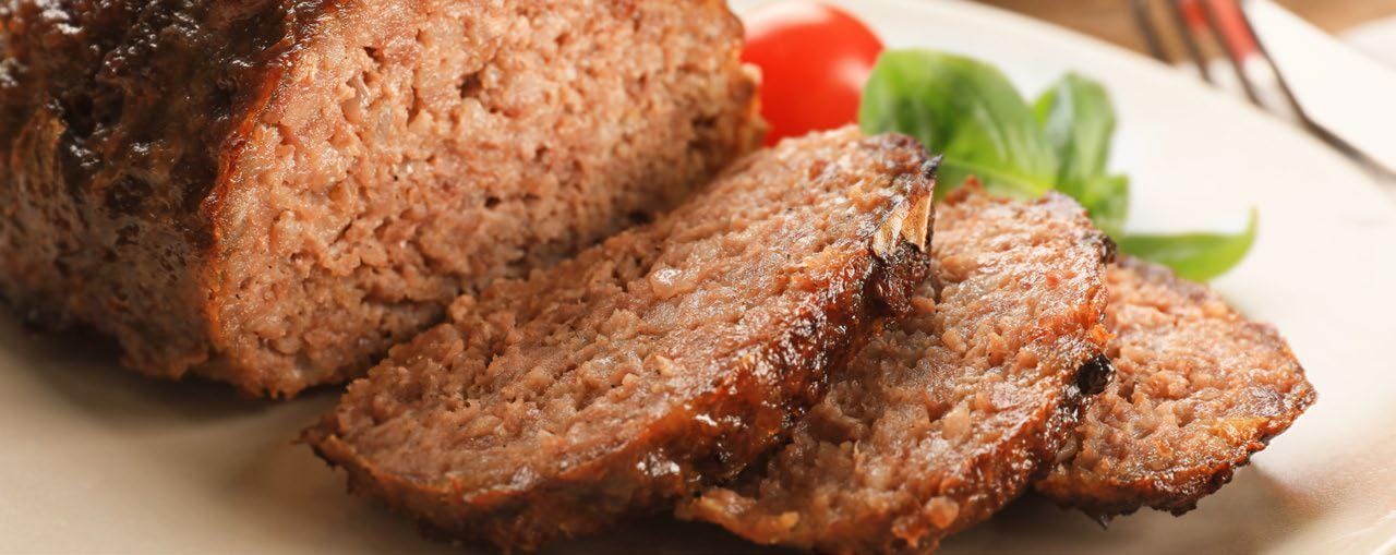 Sliced meatloaf on a platter