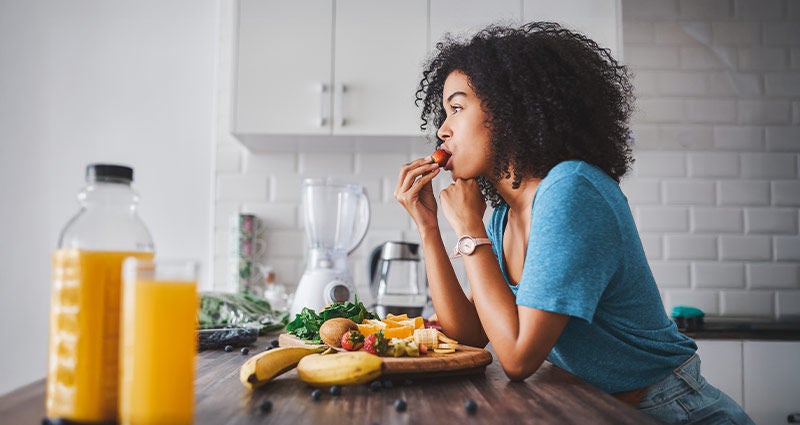 Calm your mind with foods: pensive woman eating