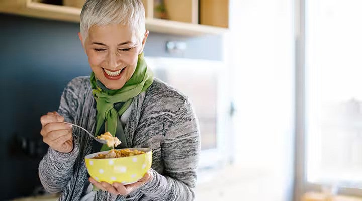 Lady eating yogurt
