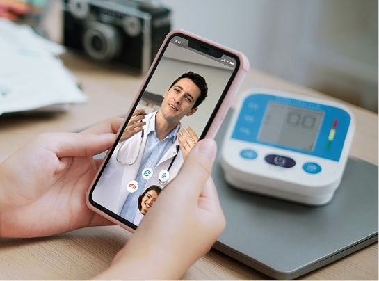 Smartphone screen showing a live video consultation with a Nurse Practitioner