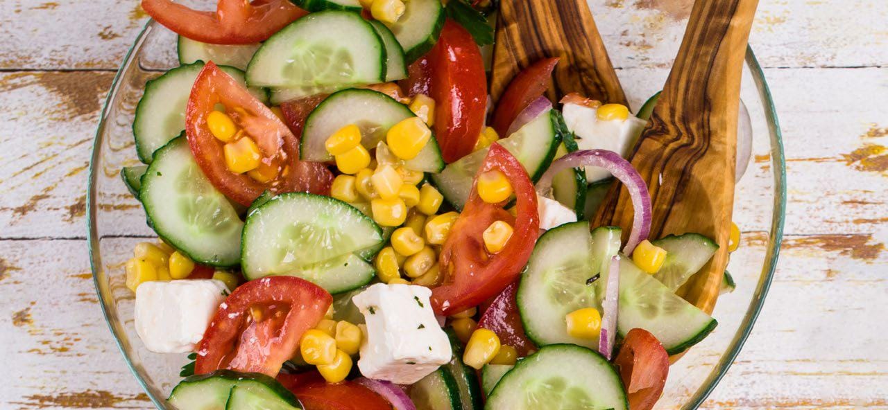 Fresh corn salad with tomato, basil & feta