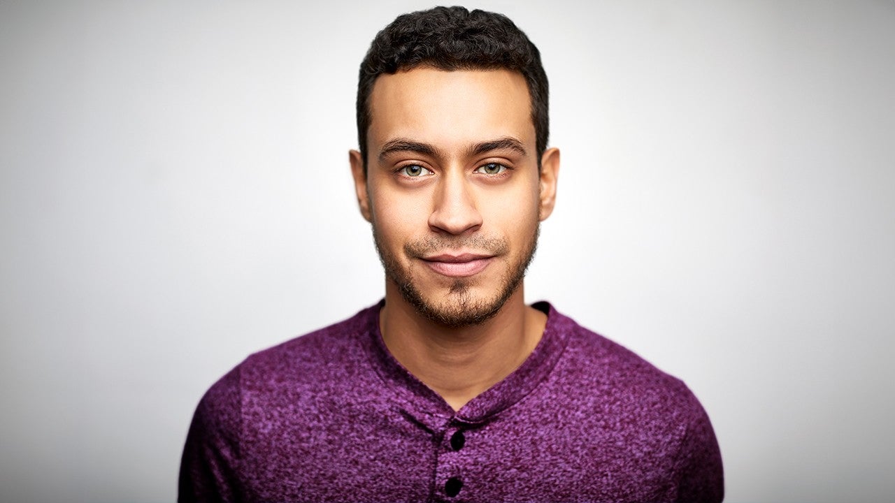 Man in purple shirt