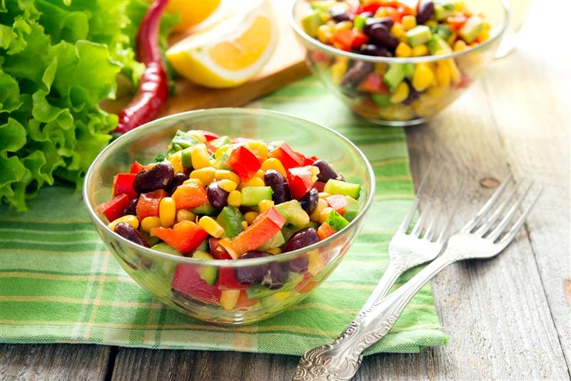 Black bean salad with corn, tomatoes, avocado, and cilantro