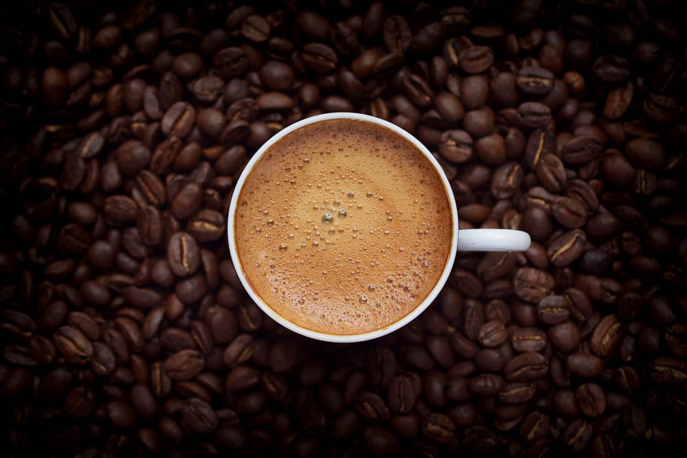 Coffee cup and coffee beans