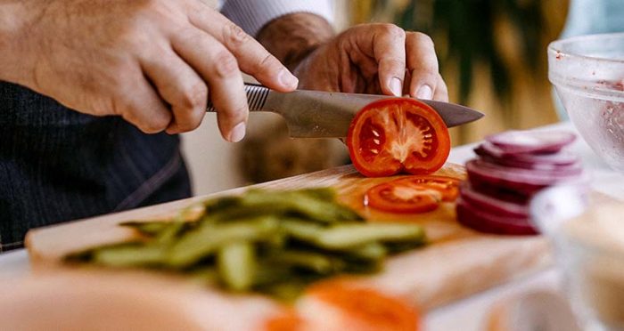 Person chopping vegetables