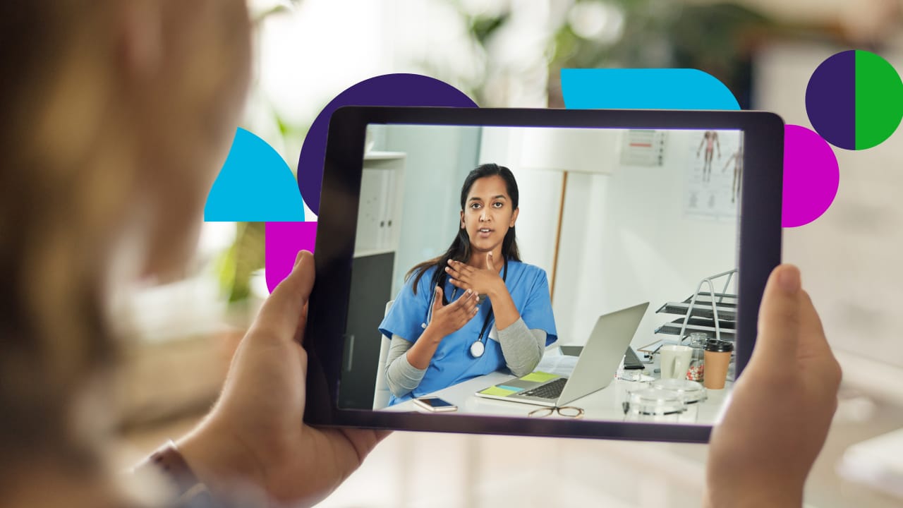 Person holding tablet while on a video call
