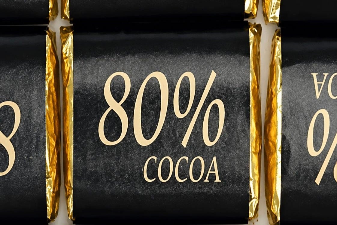 Dark label with gold lettering that says 80 percent cocoa.