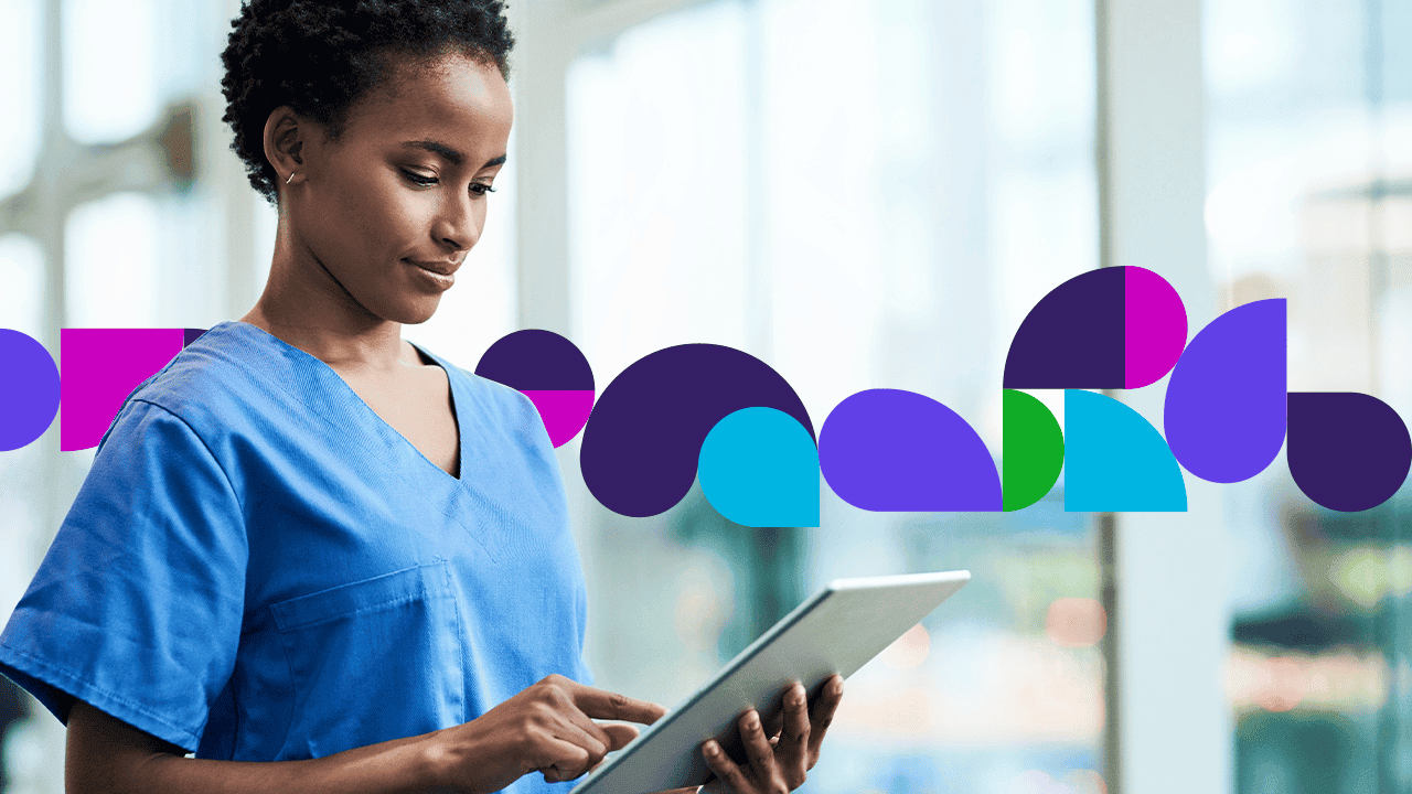 Medical professional looking at tablet