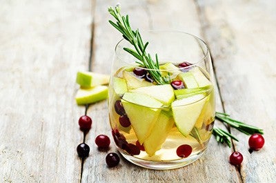 Cranberry white wine apple sangria. Toning. selective focus