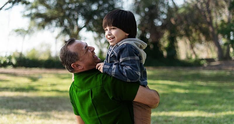 All the feels: dad and son in park