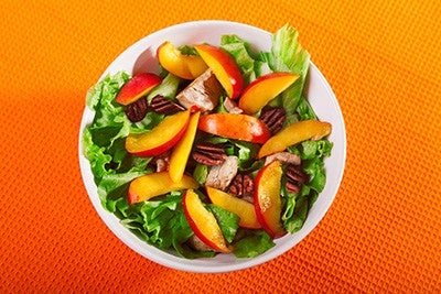Chicken salad with peaches and green salad