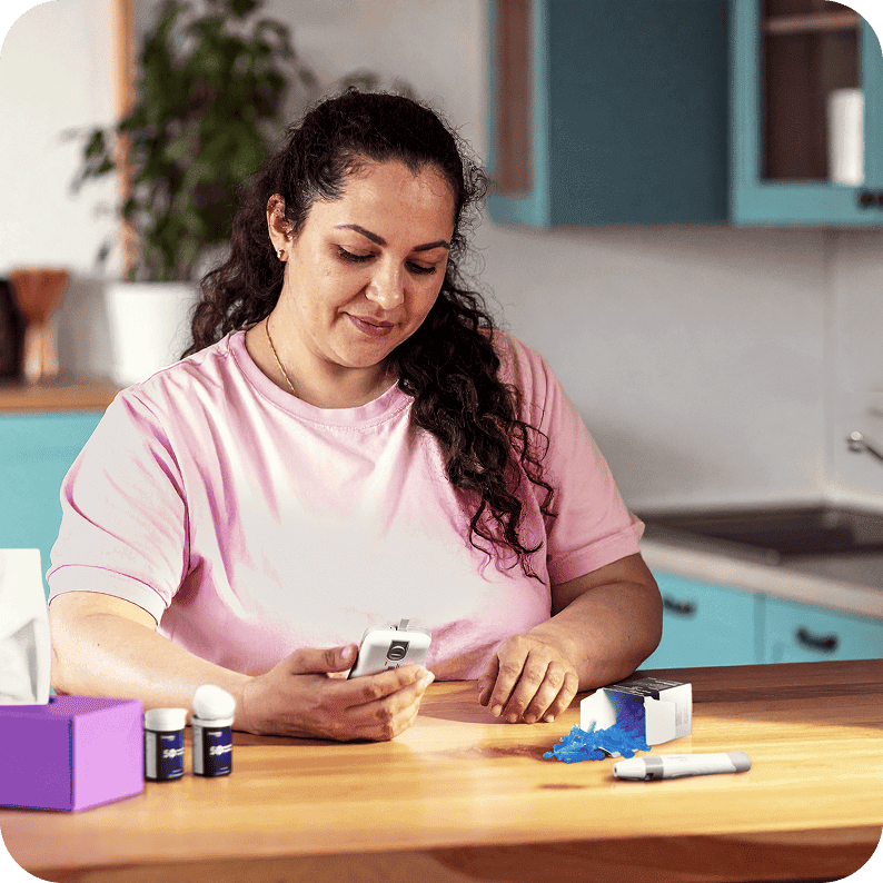 Woman testing her blood sugar level