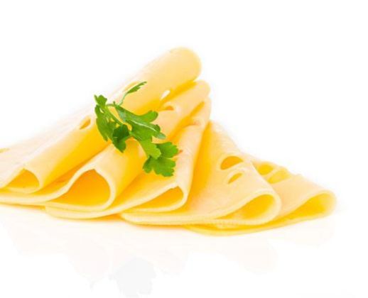 Stacked slices of Swiss cheese garnished with parsley