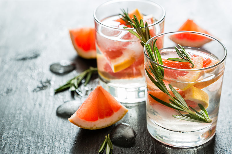 Summer refreshing drink made with grapefruit and rosemary