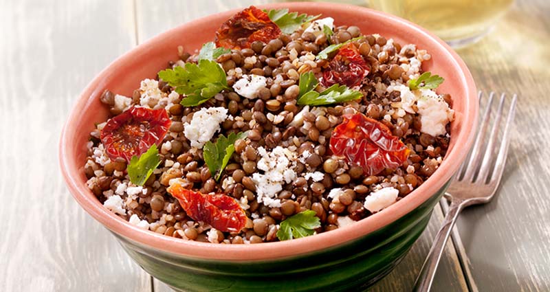 A bowl filled with a healthy lentil salad