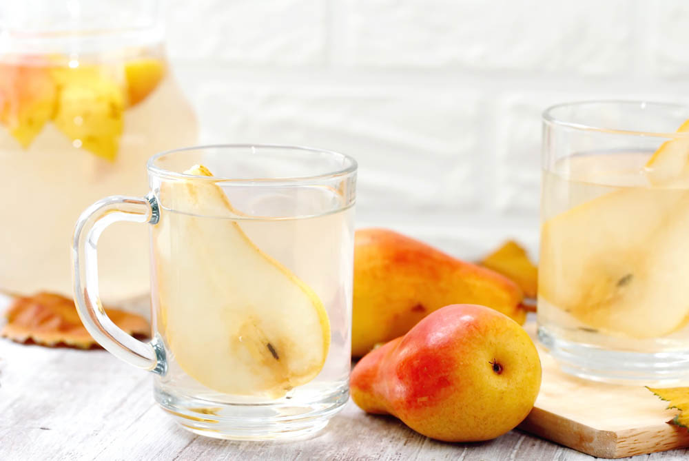 Homemade sweet pear compote made of fresh fruit