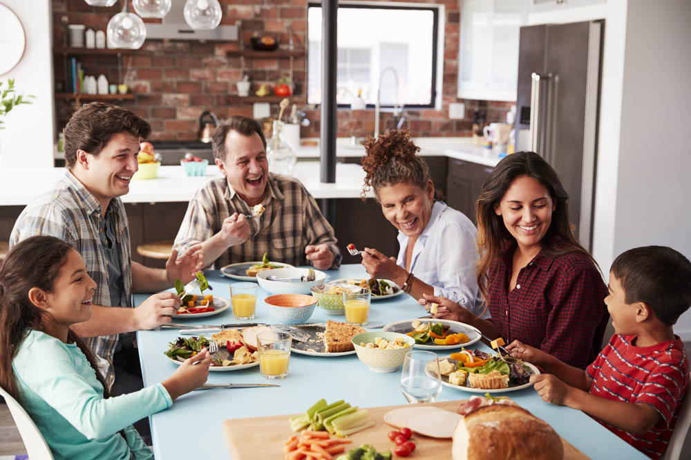 Family enjoying a healthy meal together at home.