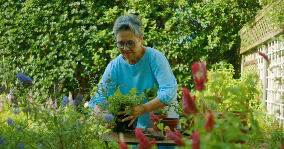 Barb working in her garden