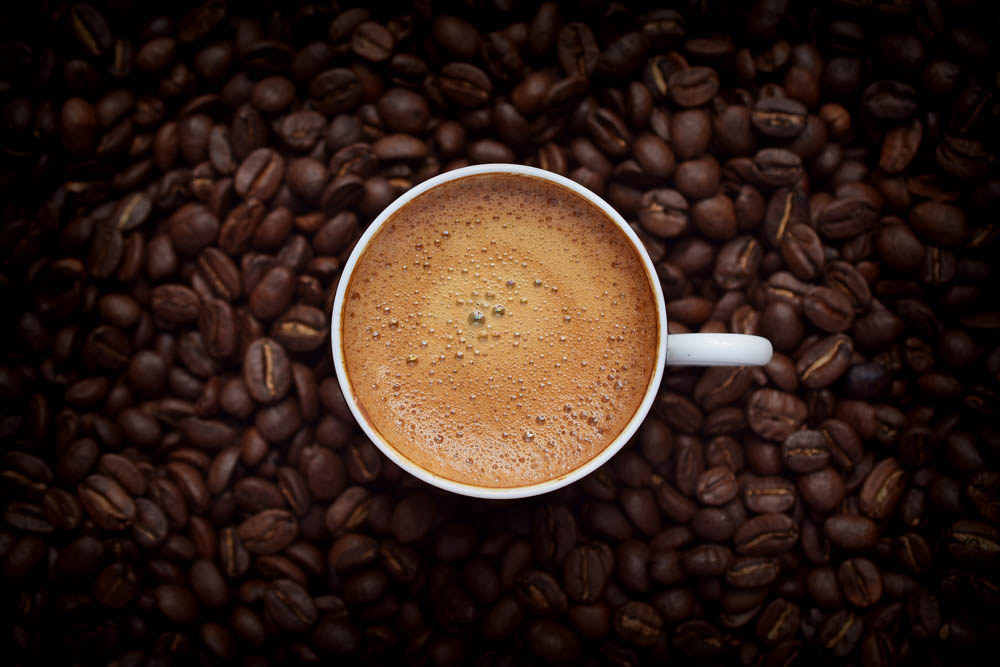 Coffee cup and coffee beans
