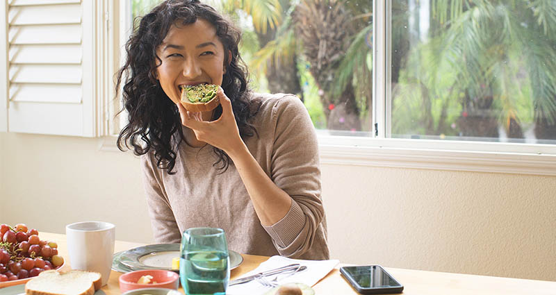 Girl eating Plant Based Swaps