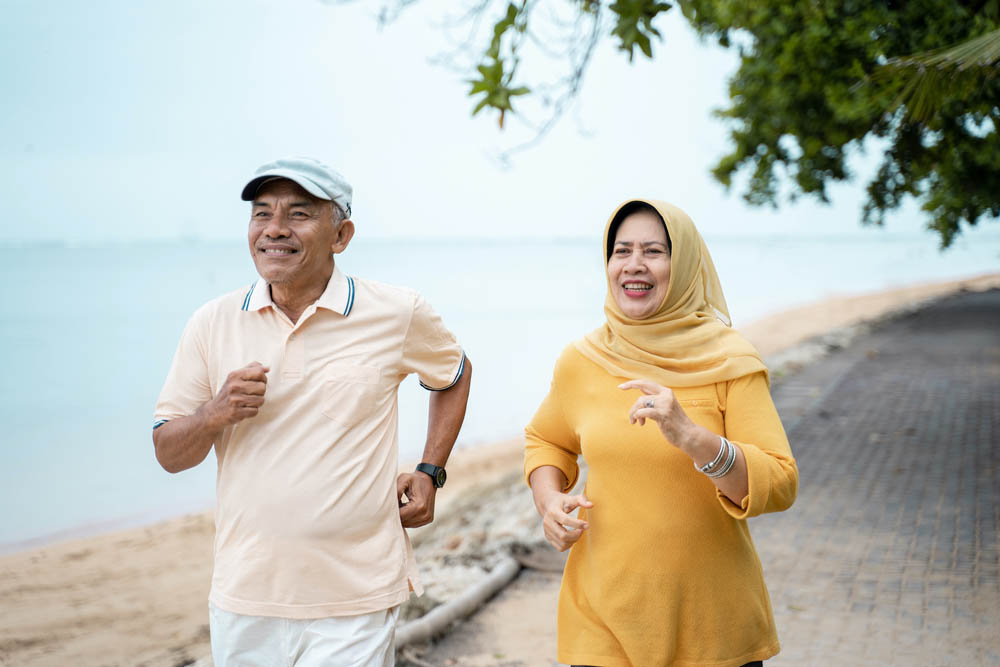 muslim mature couple doing jogging together in the morning