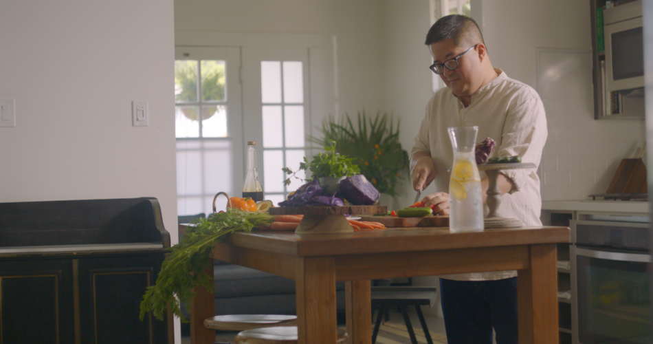 Diabetes Management member Howie is in his kitchen cooking healthy food