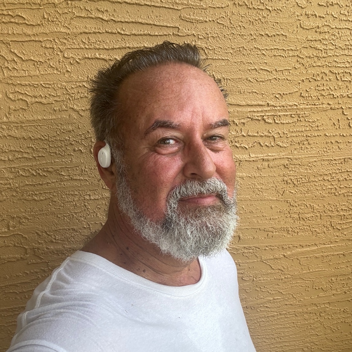 Headshot of Armando A., man with gray beard
