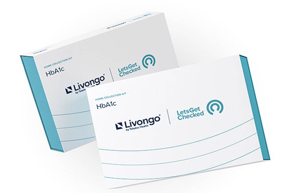 Two HbA1c home collection test kits branded with 'Livongo' and 'LetsGetChecked' logos, placed at an angle on a white background
