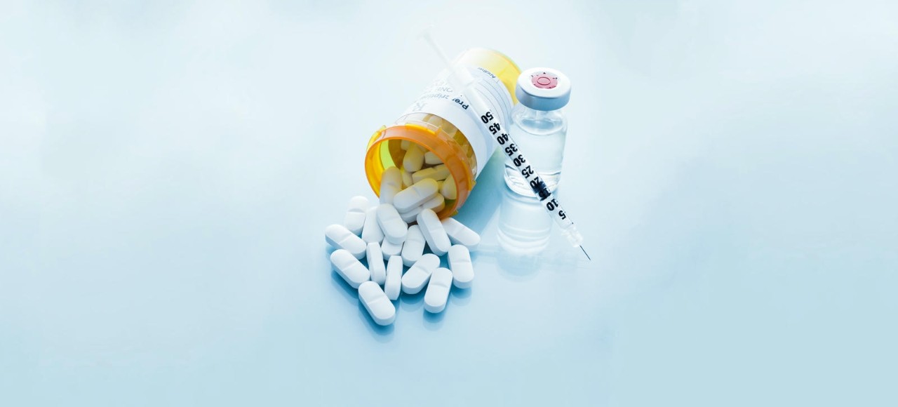 Syringe and Pills