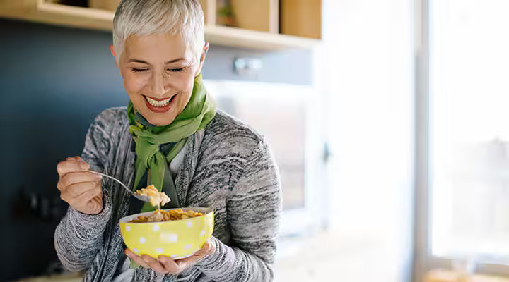 Lady eating yogurt