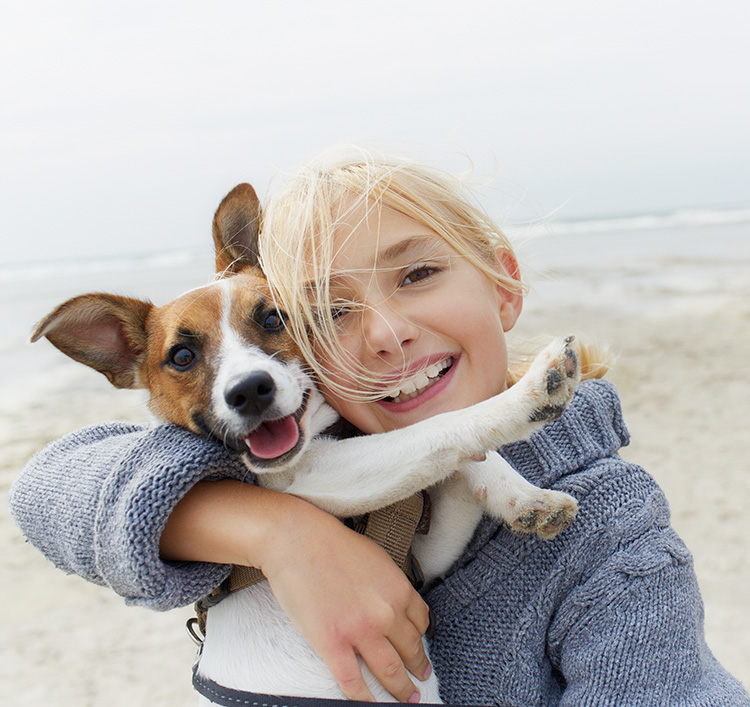 Woman holding her puppy