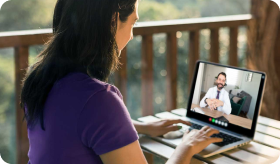 Doctor meeting remotely with his patient