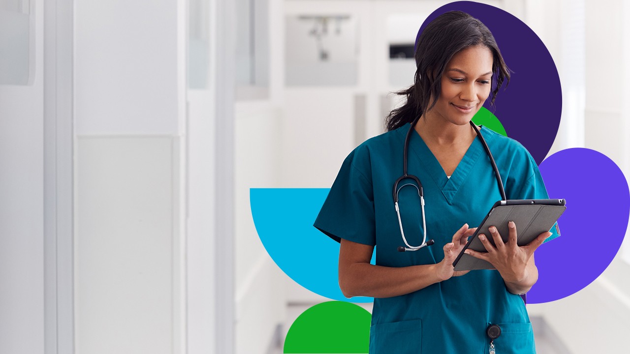 Medical professional looking at tablet